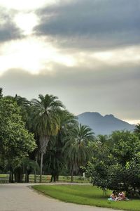 Scenic view of landscape against cloudy sky