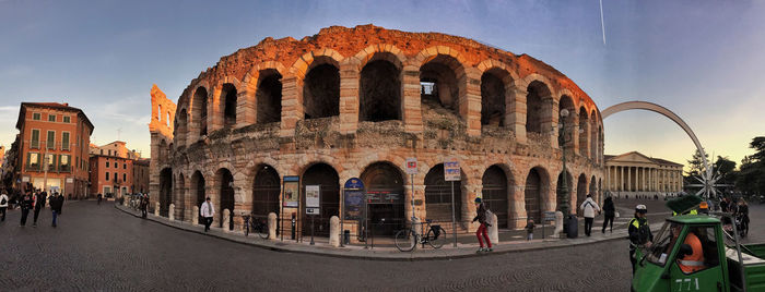 Group of people in front of historical building