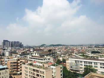 High angle shot of townscape against sky