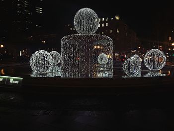 Illuminated christmas lights at night