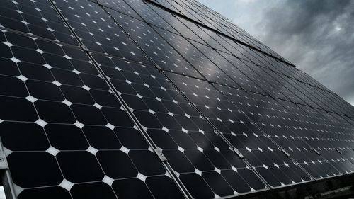 Low angle view of solar panel against sky