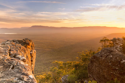 Scenic view of mountains against sky during sunset