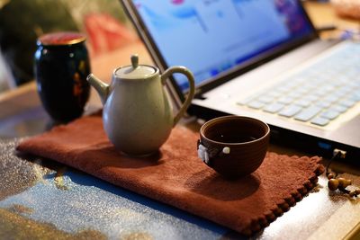 Close-up of tea cup on table