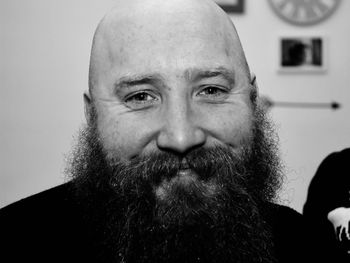 Close-up portrait of bald man