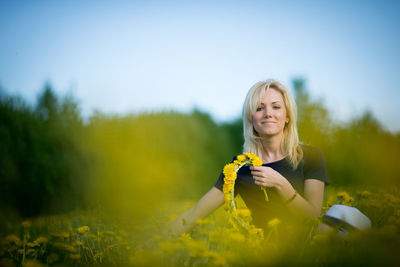 Portrait of woman in field