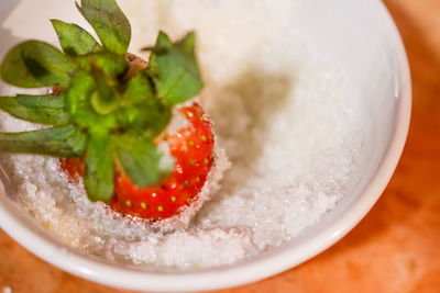 High angle view of fruit salad in bowl on table