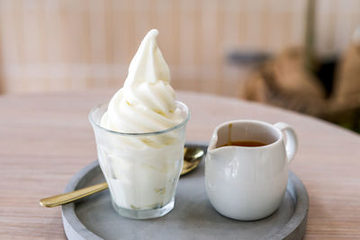 Close-up of coffee cup on table