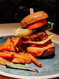 Close-up of burger in plate on table