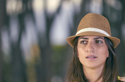 Close-up of woman wearing hat