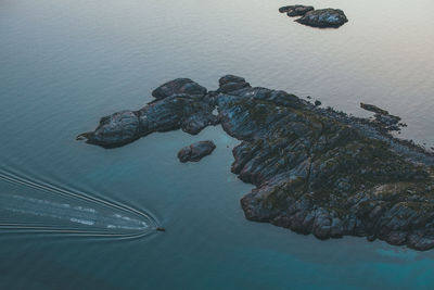 High angle view of rock formation in sea