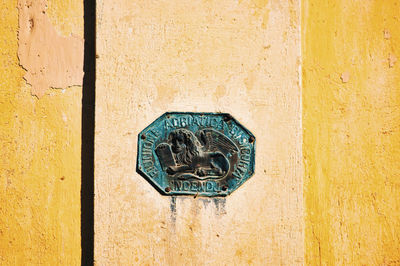 Close-up of mailbox on wall