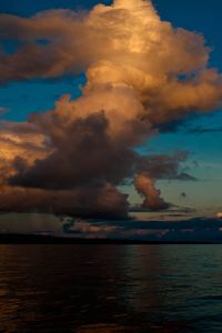 Scenic view of sea against sky at sunset