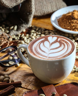 Close-up of cappuccino on table