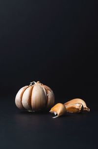 Close-up of objects on table against black background