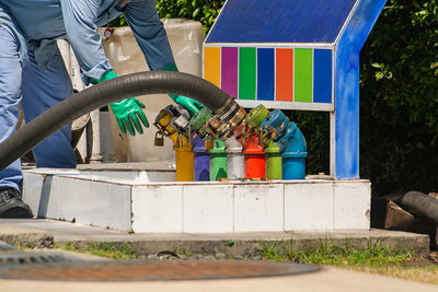 Low section of man working in water