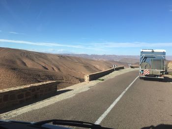 Road seen through car windshield