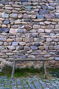 Stone wall with brick wall