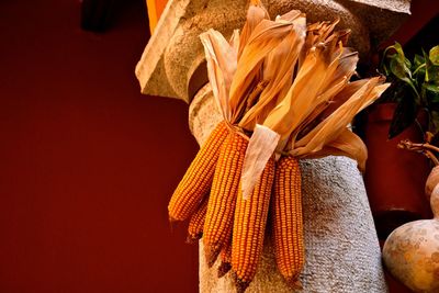 Close-up of orange flowers on table