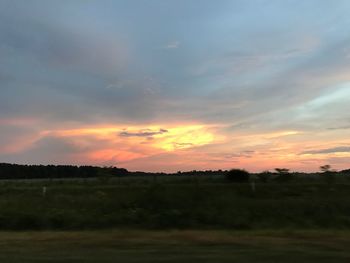 Scenic view of silhouette landscape against sky during sunset