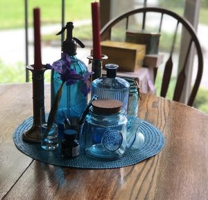 Close-up of electric lamp on table at home