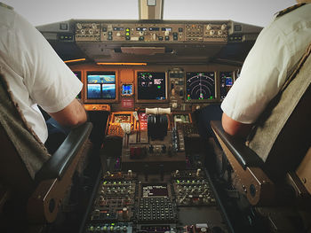 Aircraft boeing 777 cockpit and crew