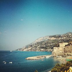 Scenic view of sea against blue sky