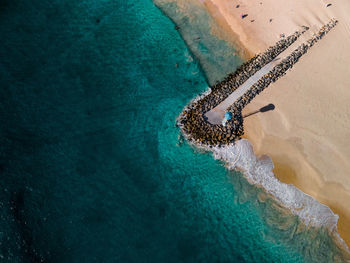 High angle view of umbrella on beach