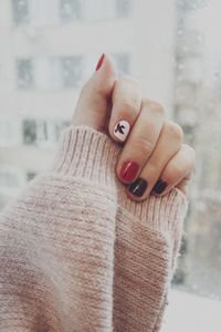 Close-up of woman hand on finger