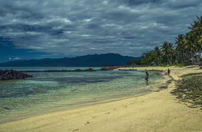 Scenic view of beach against sky