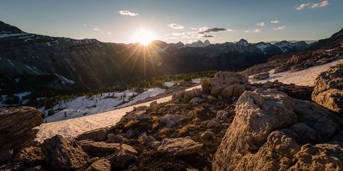 Mountain range against sky during sunset 