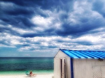 Scenic view of sea against cloudy sky