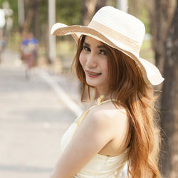 Young woman standing at park