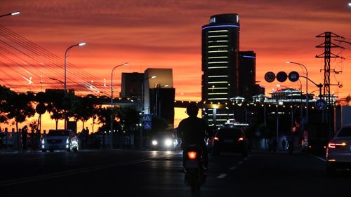 Silhouette of city at night