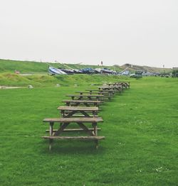 Gazebo on field against clear sky