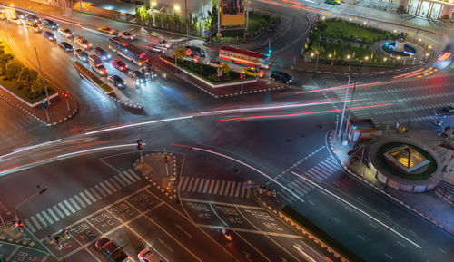 High angle view of light trails on city street