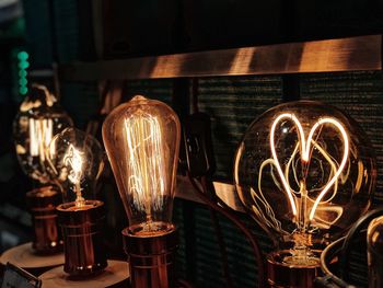 Close-up of illuminated light bulb