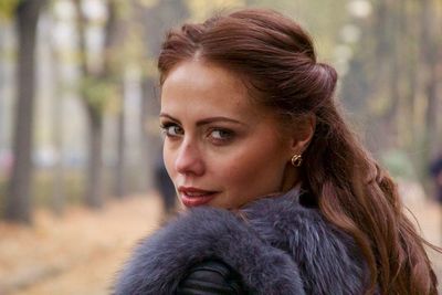 Portrait of woman looking at winter