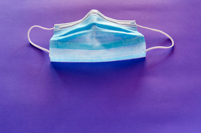 High angle view of blue glass on table