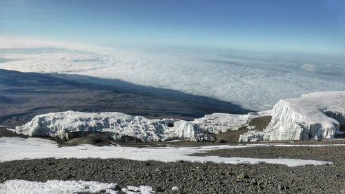 Scenic view of snow covered mountains