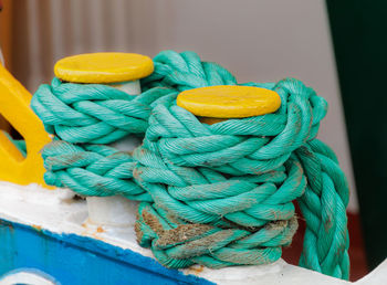 Close-up of the ropes tied to the cleat