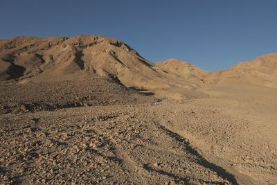 Scenic view of desert against clear sky