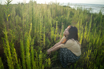 Woman standing on field