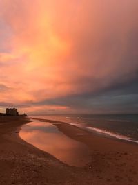 Scenic view of beach during sunset