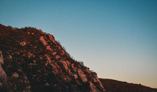 Scenic view of mountains against clear sky