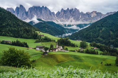 Scenic view of landscape and mountains against sky