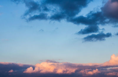 Low angle view of dramatic sky during sunset