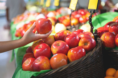 Strawberries in basket at market stall