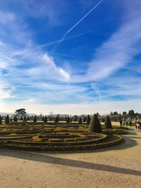 Panoramic view of landscape against blue sky