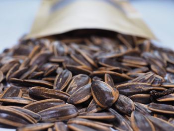 Close-up of coffee beans on table