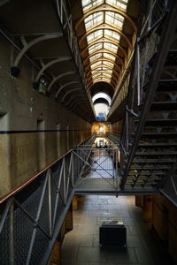 Interior of illuminated railroad station building